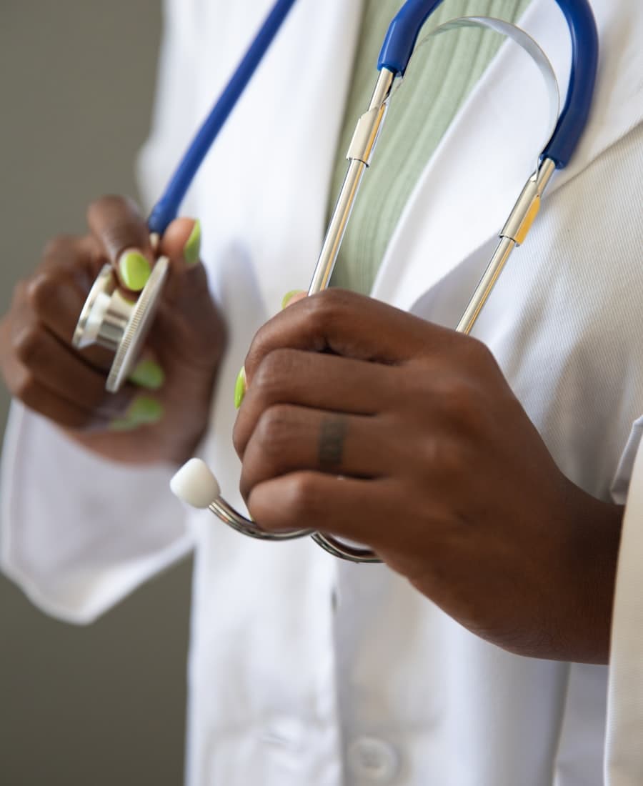 A medical provider holding a stethoscope, representing supervised GLP-1 care